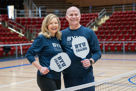 President & Sister Meredith playing pickleball.