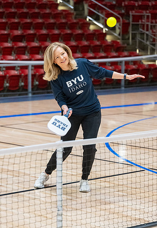 President & Sister Meredith playing pickleball.