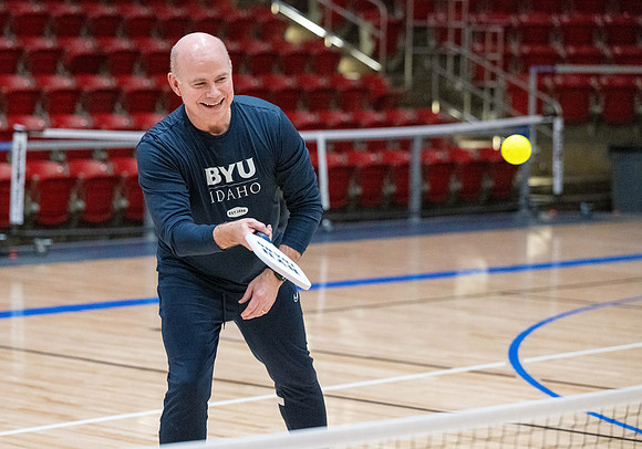 President & Sister Meredith playing pickleball.