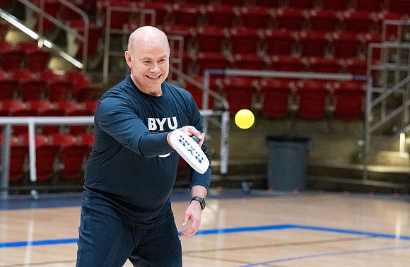 President & Sister Meredith playing pickleball.