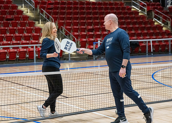 President & Sister Meredith playing pickleball.