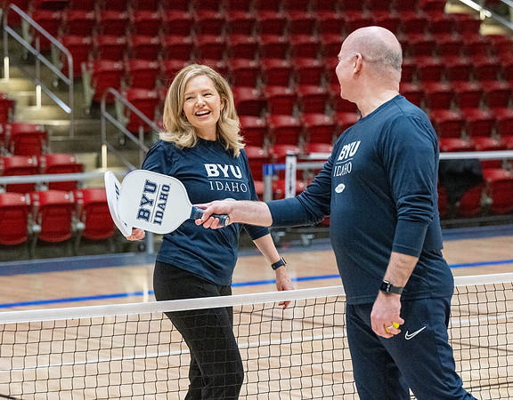 President & Sister Meredith playing pickleball.
