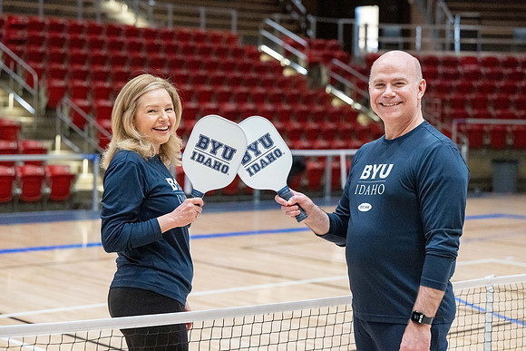 President & Sister Meredith playing pickleball.