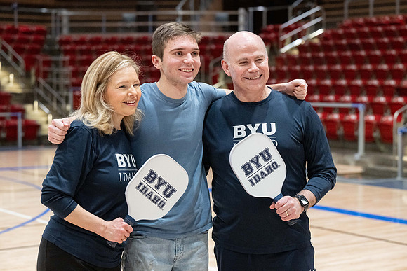 President & Sister Meredith playing pickleball.