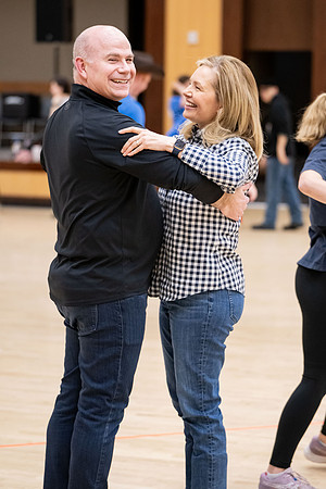 President and Sister Meredith try country dancing.