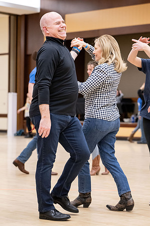 President and Sister Meredith try country dancing.