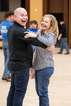 President and Sister Meredith try country dancing.