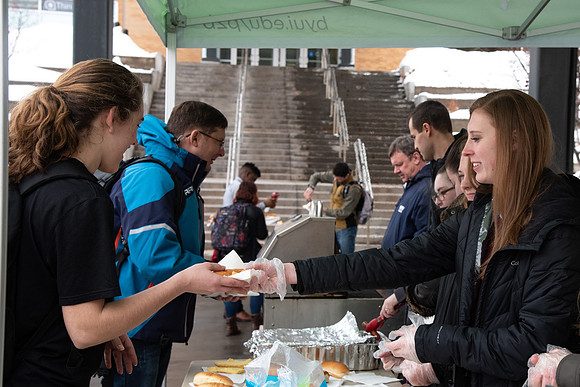 Power to Become council gives away free hotdogs to students to help get them excited to go to the P2B event.