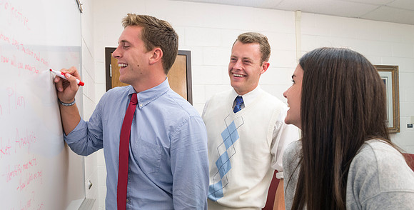 Students pose for Applied Learning Projects' web layout.