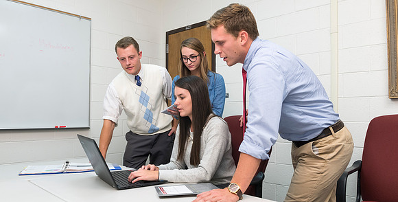 Students pose for Applied Learning Projects' web layout.