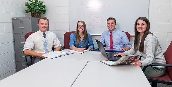 Students pose for Applied Learning Projects' web layout.