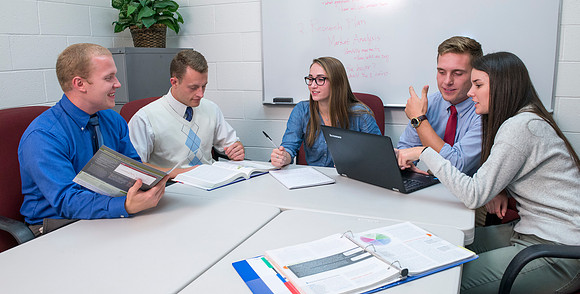 Students pose for Applied Learning Projects' web layout.