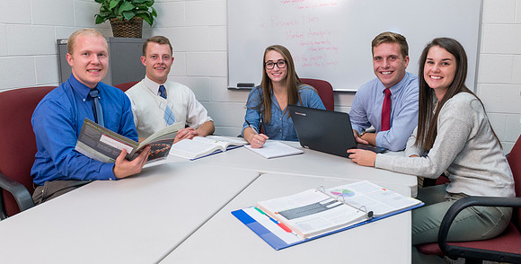 Students pose for Applied Learning Projects' web layout.