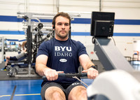 A student using the rowing machine at the Hart Fitness Center.