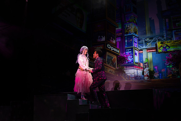 Students performing in the play The Mikado.