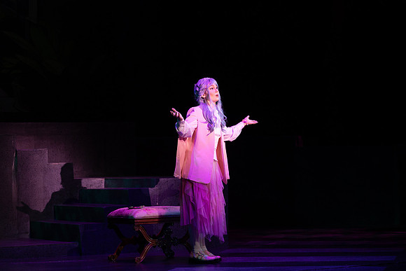 Students performing in the play The Mikado.