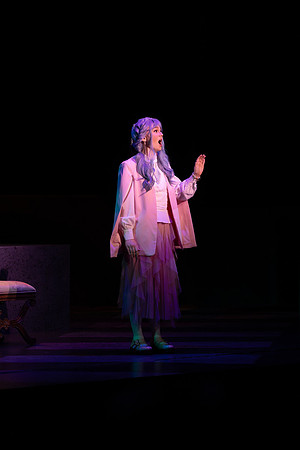 Students performing in the play The Mikado.