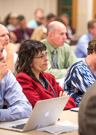 Faculty members come together in preparation of the new school year.