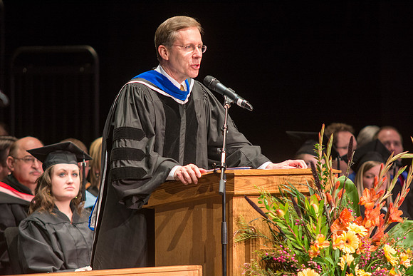 Kevin Bower, Dean of the College of Performing and Visual Arts, makes some final remarks to students before they receive their diplomas.