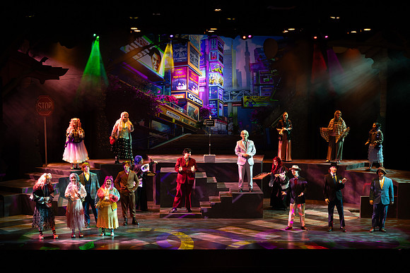 Students performing in the play The Mikado.