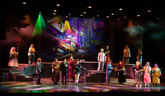 Students performing in the play The Mikado.