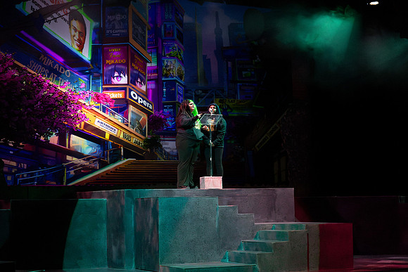 Students performing in the play The Mikado.
