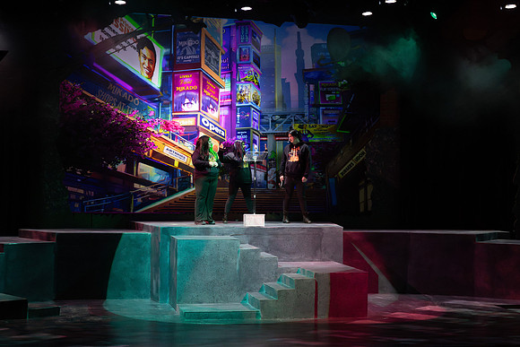 Students performing in the play The Mikado.