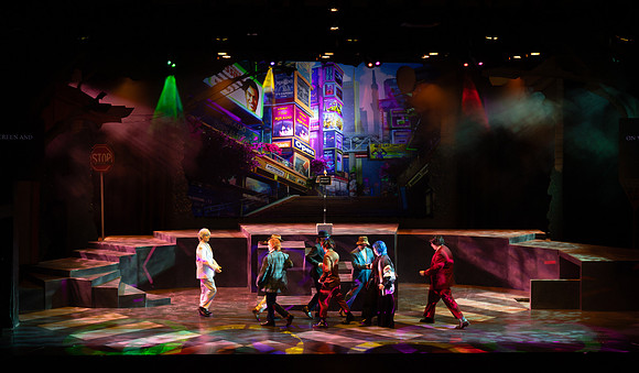 Students performing in the play The Mikado.
