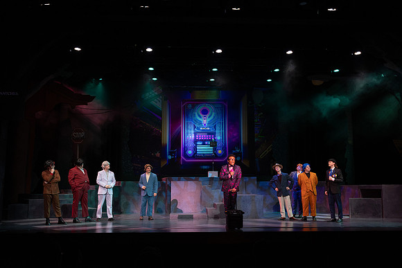 Students performing in the play The Mikado.