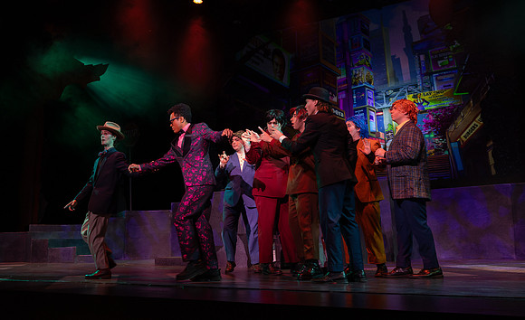 Students performing in the play The Mikado.