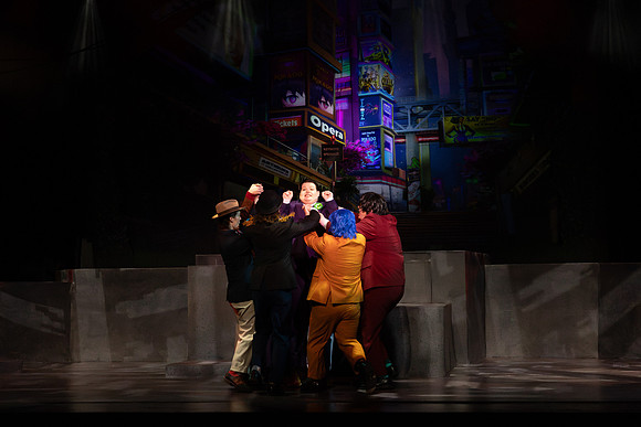 Students performing in the play The Mikado.