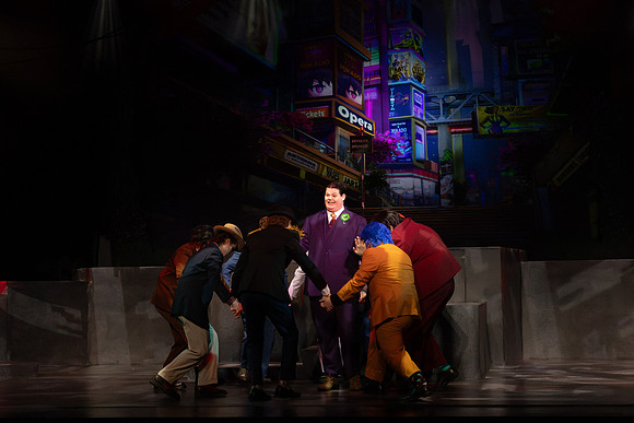 Students performing in the play The Mikado.