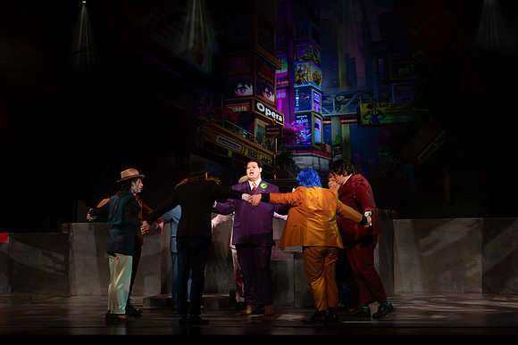 Students performing in the play The Mikado.