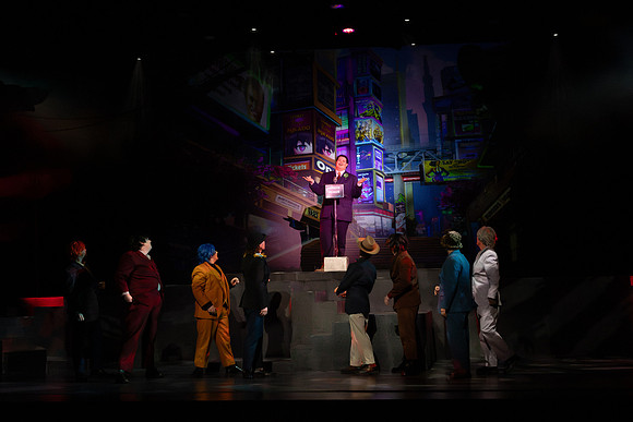 Students performing in the play The Mikado.
