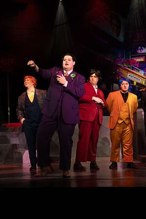 Students performing in the play The Mikado.