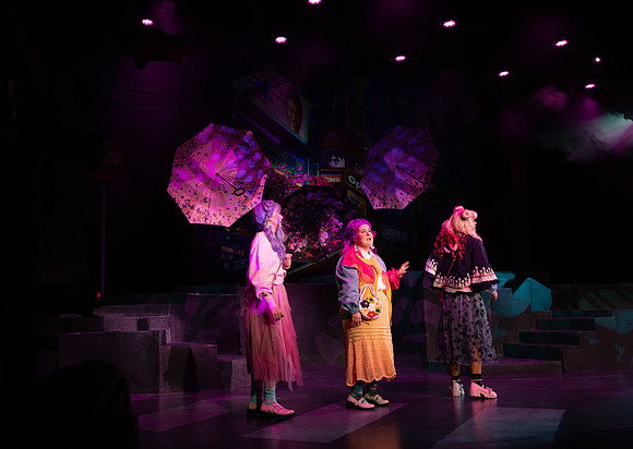 Students performing in the play The Mikado.