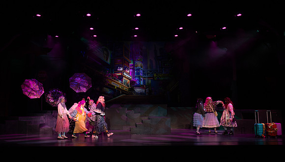 Students performing in the play The Mikado.