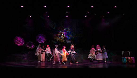 Students performing in the play The Mikado.