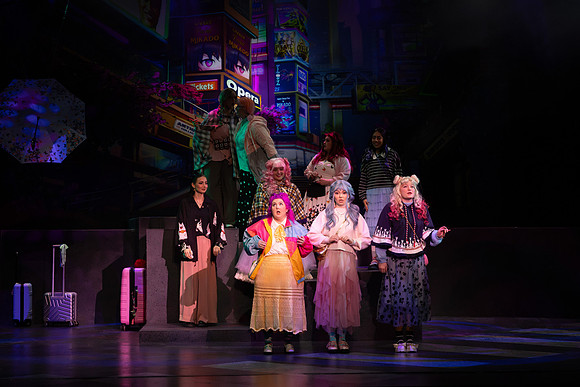 Students performing in the play The Mikado.
