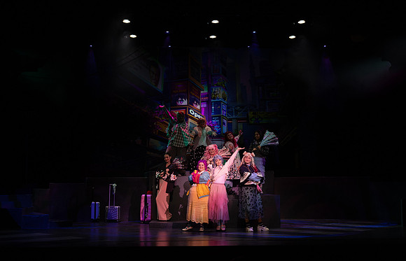 Students performing in the play The Mikado.