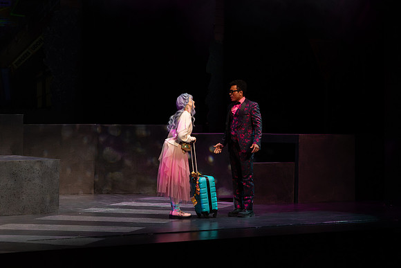 Students performing in the play The Mikado.