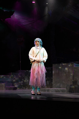 Students performing in the play The Mikado.