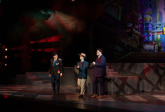 Students performing in the play The Mikado.