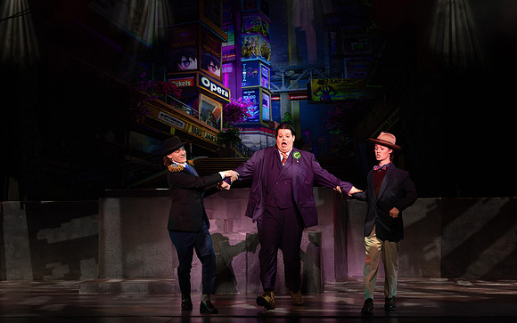 Students performing in the play The Mikado.