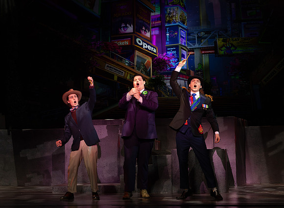 Students performing in the play The Mikado.