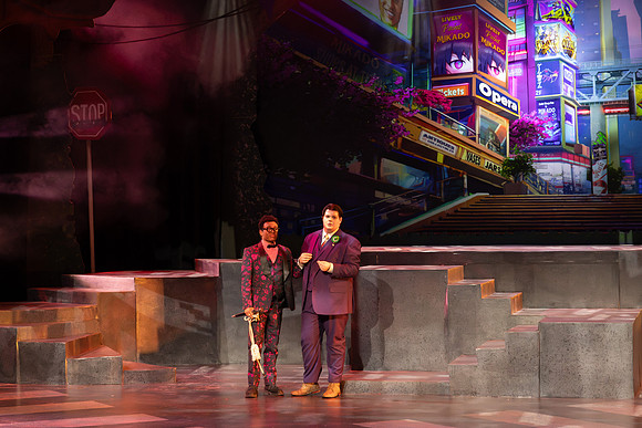 Students performing in the play The Mikado.
