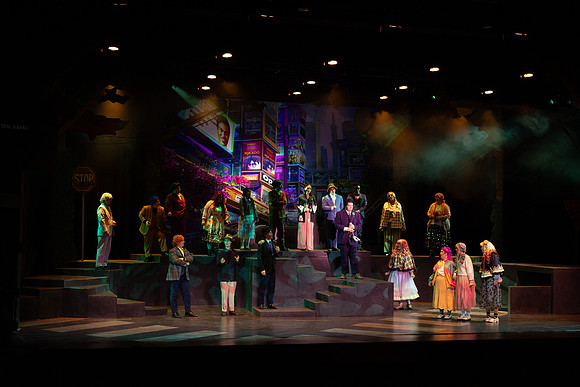 Students performing in the play The Mikado.