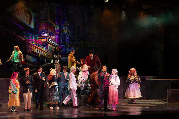 Students performing in the play The Mikado.