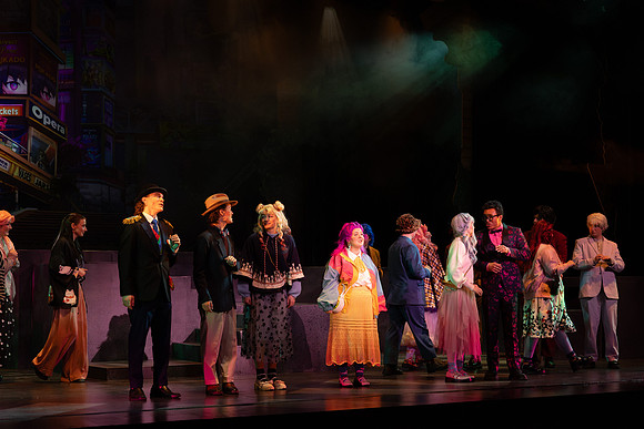 Students performing in the play The Mikado.