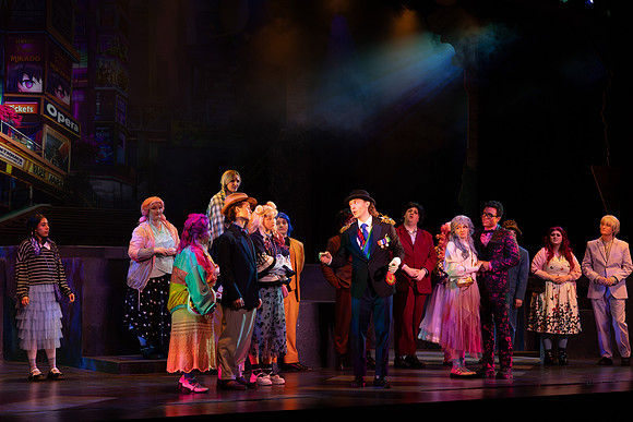 Students performing in the play The Mikado.